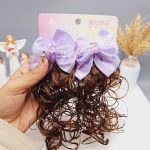 گیره مو دخترونه پاپیون طرح گل مرواريدی با موی مصنوعی (کارت دوتایی)